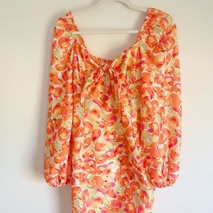 cider puff sleeved mini dress with orange and pink floral details🌷🧡